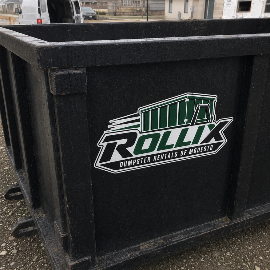 Clean Rollix roll-off dumpster with branded service equipment nearby